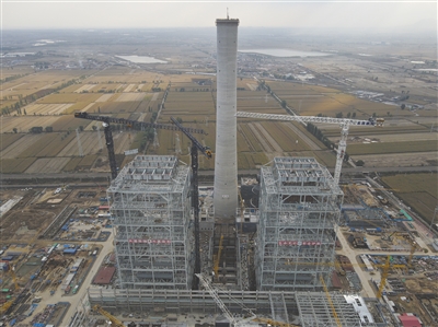 圖為晉北基地同熱三期2×100萬(wàn)千瓦煤電工程項(xiàng)目建設(shè)現(xiàn)場(chǎng)。賈曉龍攝
